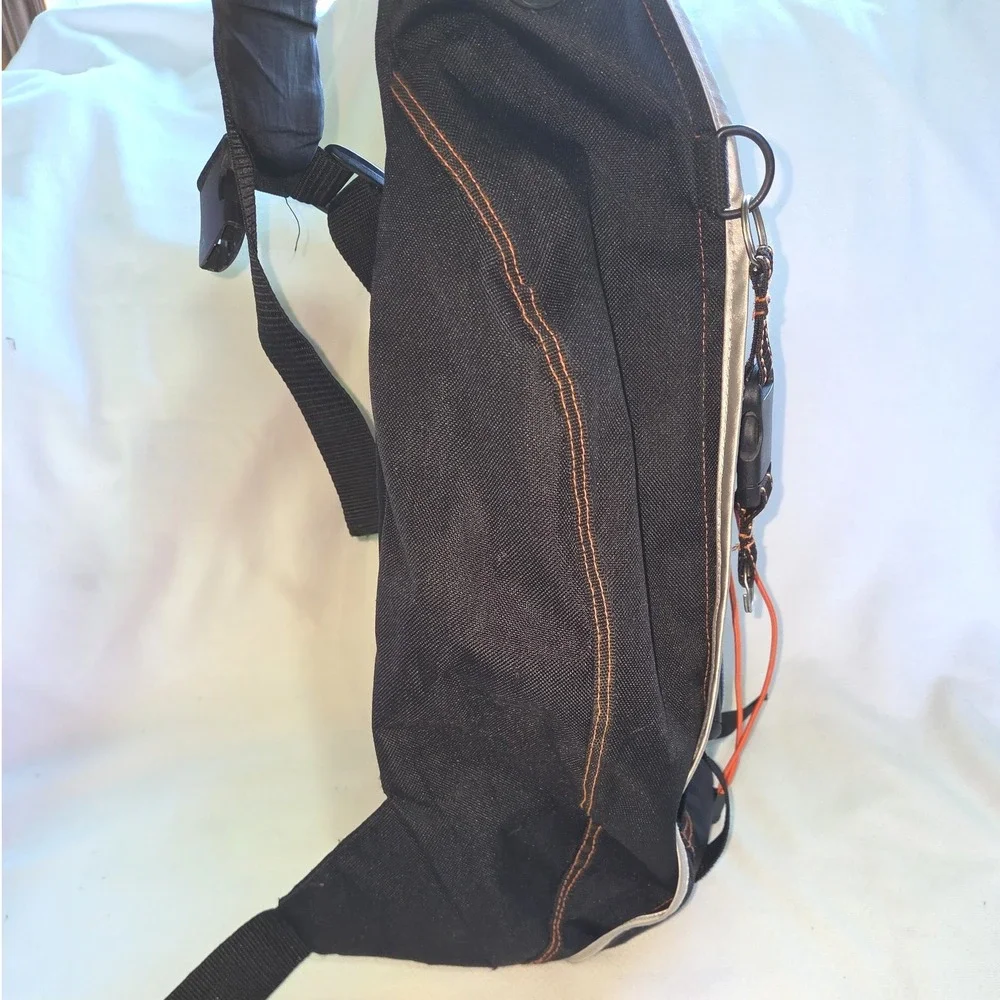 Starter‎ Sling Backpack Black Reflective Orange Stitch Bungee Bag